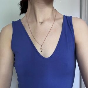 Slim blue dress with straps.